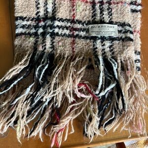 Burberry merino wool plaid scarf. Pre-owned but purchased in NYC in 2009.